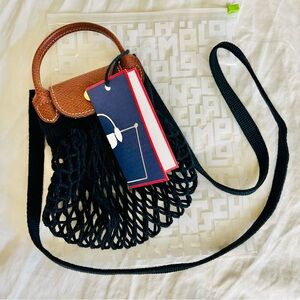 Longchamp LE PLIAGE FILET XS MESH BAG
Black - Canvas. FREE FAST SHIPPING!